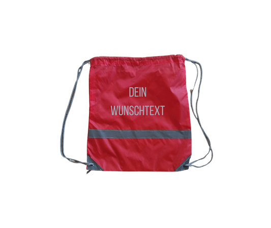 rotes Turnsackerl mit Reflektorstreifen und reflektierendem Wunschtext