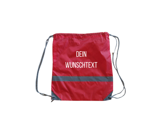 rotes Turnsackerl mit Reflektorstreifen und weißem Wunschtext