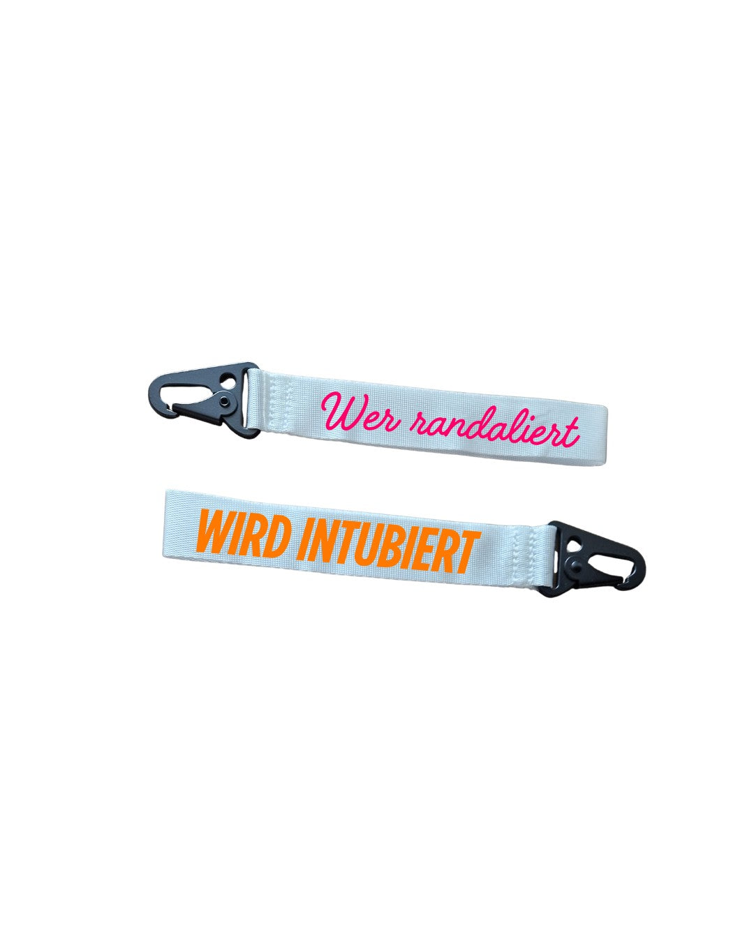 weißer schlüsselanhänger aus gurtband mit pinker schrift "wer randaliert" andere seite orange schrift "wird intubiert"