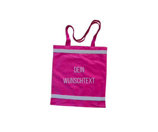 Stylische rosa Einkaufstasche mit reflektierenden Streifen sowie reflektierendem Wunschtext