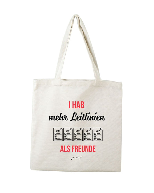 Baumwolltasche natur mit rotem und schwarzem Textaufdruck "Ich hab mehr Leitlinien als Freunde" und fünf SOP-Dokumenten als Grafik - Medizinstudenten Humor
